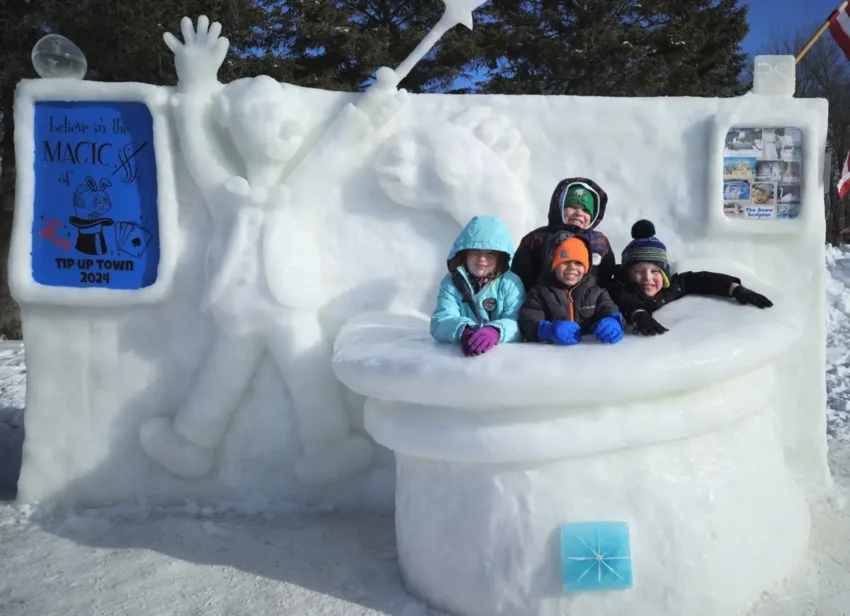 kids sitting in ice sculpture with a magic theme
