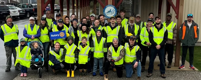 Roscommon Rotary group posing after community cleanup