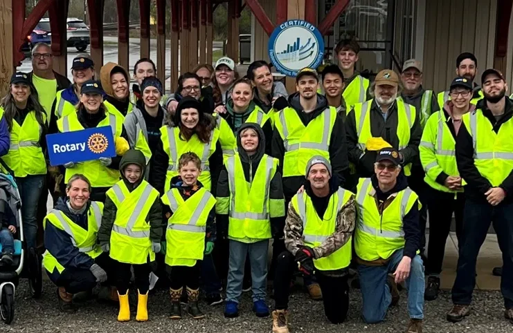 Roscommon Rotary group posing after community cleanup